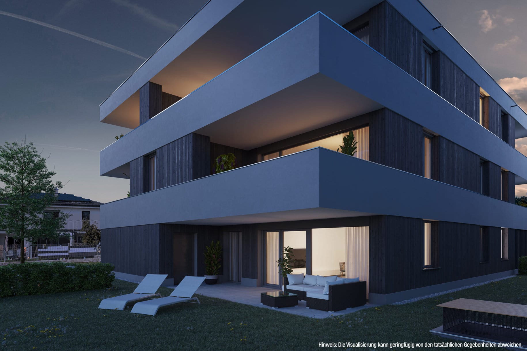 Moderne Fassade Wohnanlage Klöppergasse Wolfurt mit großflächigen Glasflächen